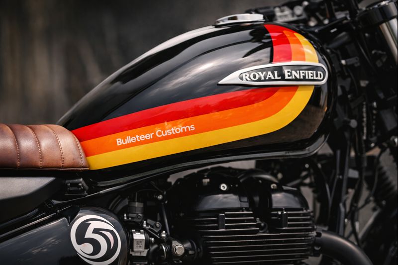 Rear suspension and exhaust detail on custom Royal Enfield Thunderbird