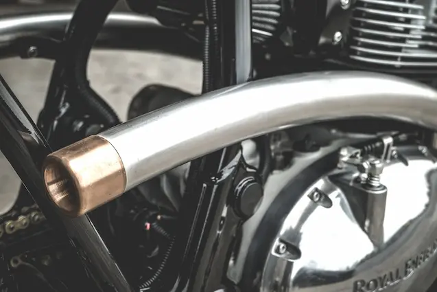 Custom stainless steel exhaust with brass tip on Royal Enfield Interceptor 650 Zeus Custom