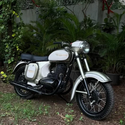 Vintage Jawa 250 restoration complete motorcycle studio view