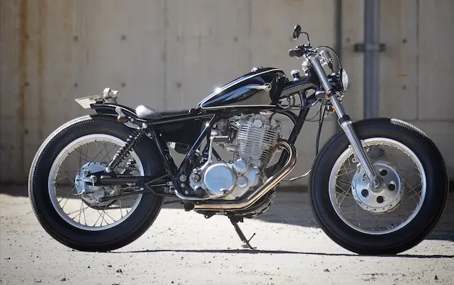 Heiwa Motorcycle custom Yamaha SR400 bobber with black tank and minimalist Japanese styling side view