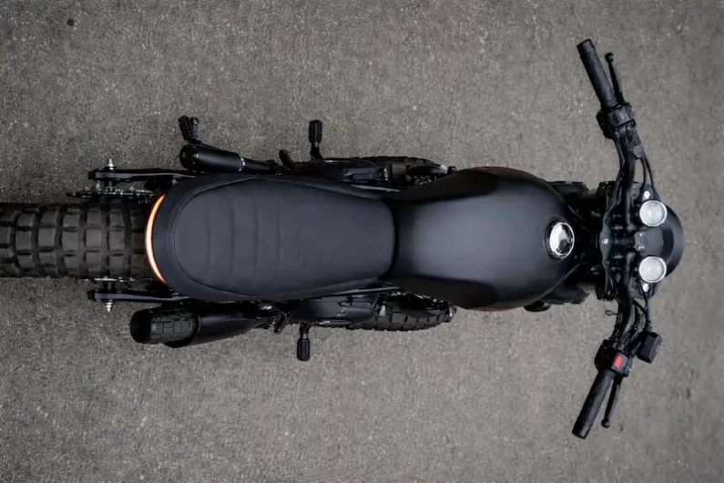 Top view of Royal Enfield Himalayan KGF custom build showing matte black tank, seat and handlebar setup