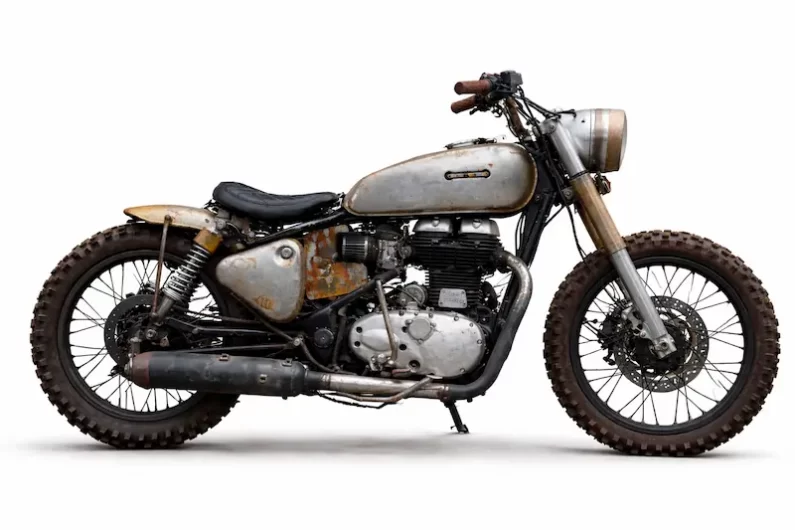 Royal Enfield UCE Bullet 500 by Bombay Custom Works side profile with scrambler styling and patina fuel tank