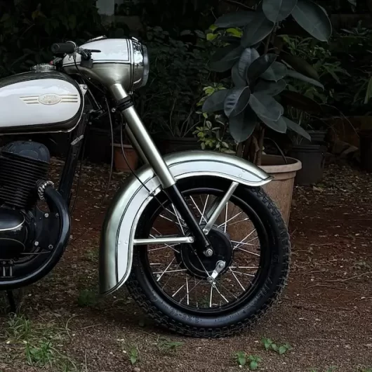 Jawa 250 classic headlamp nacelle and tank restoration detail